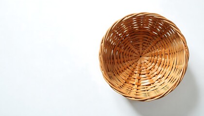 Obraz premium a woven basket against a plain white backdrop, handcrafted rattan basket, wicker basket with handle, created with generative ai