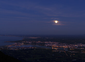 Full moon over Hondarribia and Hendaye, Basque Country