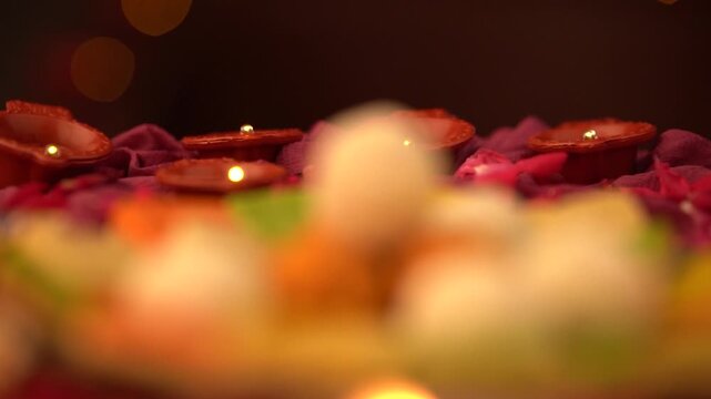 Diwali sweets video with bokeh light on the backgroud