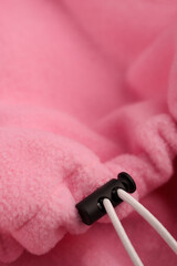 Pink fleece with lace detail. Fashion, textiles, accessories.