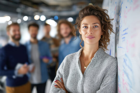 Female Executive Leading Strategic Planning with Diverse Team in High-Tech Office - Powered by Adobe