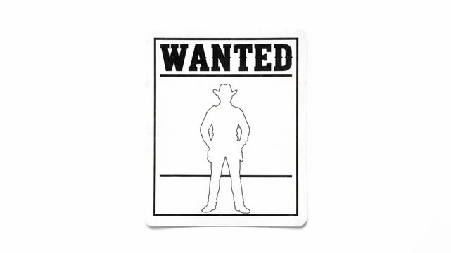 Wanted Poster Silhouette - This video features a classic "WANTED" poster with a silhouette of a cowboy or sheriff.