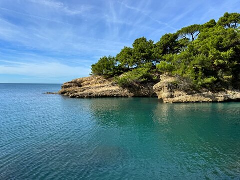 Mediterranean sea, coastal rocks and sky.