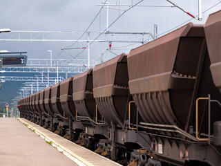 A freight train transporting iron ore from Kiruna, Sweden to Narvik, Norway. Summer 2023.Abisko, Western Europe