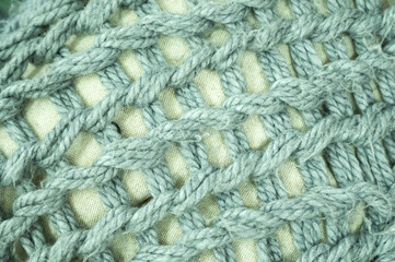 Macro Texture of a Thick, Chunky Knit Blue Wool Fabric. Woven Textile Background