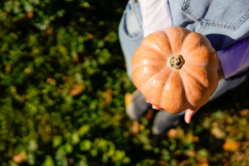 Woman Holding Jack-o-Lantern in halloween