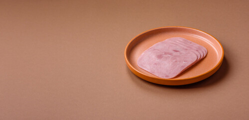 Meat, square ham sliced, organic food, protein for snacks. Sliced ham as a background
