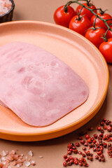 Meat, square ham sliced, organic food, protein for snacks. Sliced ham as a background