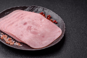 Meat, square ham sliced, organic food, protein for snacks. Sliced ham as a background