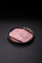 Naklejka premium Meat, square ham sliced, organic food, protein for snacks. Sliced ham as a background