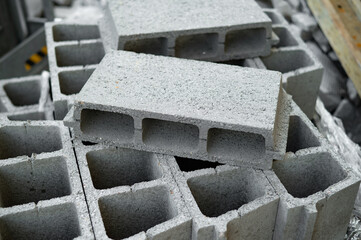 Concrete hollow filler blocks for ribbed slab floor systems. Lightweight construction. Concept of efficient design, material saving, and modern construction technology.