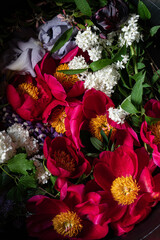 A basket brimming with pink and white flowers showcases spring's natural beauty