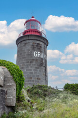 lighthouse, Phare du cap Lihou, located on a hill in the town of Granville, France