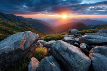 Sunset over mountain peaks and rocks