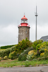 lighthouse, Phare du cap Lihou, located on a hill in the town of Granville, France