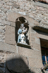 Statuette of Mary with Jesus in cathedral Le Mont Saint-Michel in Normandy, France