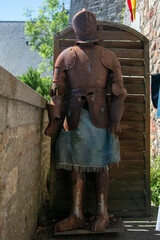 rusty armor on display in cathedral Le Mont Saint-Michel in Normandy, France