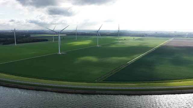 Aerial view on energy farm with wind mills generating sustainable green electricity in Flevoland, the Netherlands