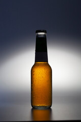 A frozen soda bottle on a white background