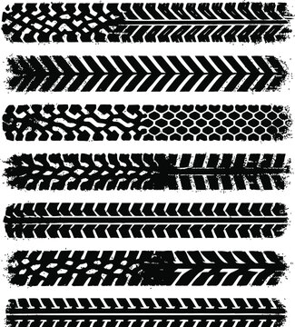 A set of black and white grunge tire tracks, wheel braking marks. Truck, car or motorcycle tread pattern silhouette.