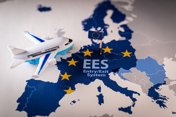 Airplane toy flying over a map of European Union countries showing the EES Entry Exit System concept, representing streamlined border control for non EU travelers
