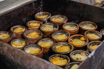 Traditional Piti soup cooking in clay pots, Shaki, Azerbaijan