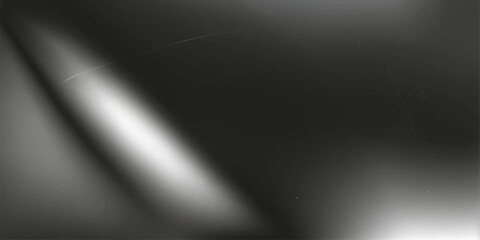 Brushed silver metal texture backdrop with a shining industrial spotlight on a stage surface