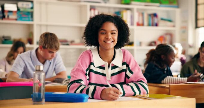 Writing, smile and face with girl in classroom for college admission tests, learning and quiz. Aptitude assessment, knowledge and academy with students in high school for lesson and scholarship