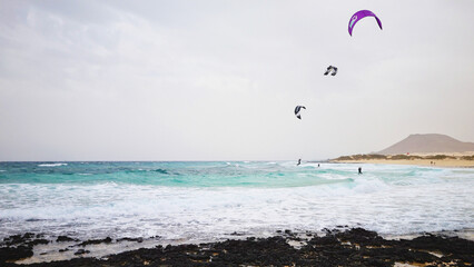 kitesurf in El Moro beach with turquoise Atlantic waters, Fuerteventura, Canary Islands, Spain