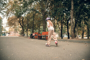 Young Girl Rollerblading in Park Setting for Beginners