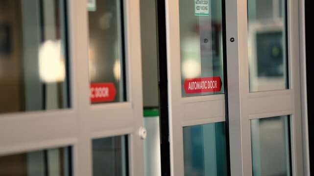 automatic sliding doors closing together