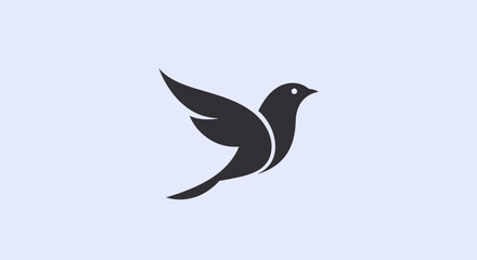 Elegant Silhouette of a Bird in Flight with Graceful Wings.