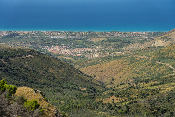 Naklejka premium Gratteri historic medieval Sicilian mountain village town with stone buildings in summer surrounded by Madonie Natural Park forest near Cefalu bay Sicily island southern Italy Europe