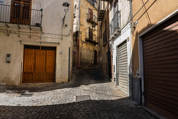 View of Isnello, a historic Sicilian mountain town in the Madonie Mountains, featuring charming narrow streets, traditional stone houses, and a Gothic church, Sicily, Italy. Italian town in hills