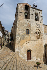 Fototapeta premium Petralia Soprana, a historic Sicilian mountain town in the Madonie Mountains, featuring charming narrow streets, traditional stone houses, and famous Church of Saint Mary of Loreto, Sicily, Italy