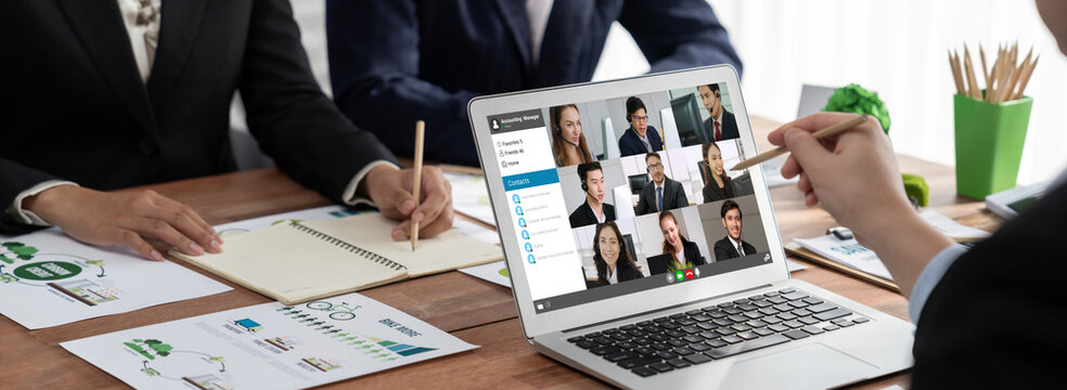 Business people on video conference for brisk virtual group meeting of corprate business office workers