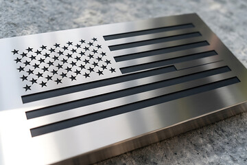 Metallic plate displays a stylized flag design, showcasing stars and stripes in a modern, industrial aesthetic.