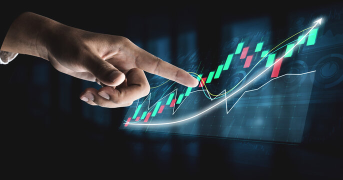 A hand interacts with a digital financial graph featuring candlestick data and an upward trend, showcasing modern market analysis techniques for investors. Impute - Powered by Adobe
