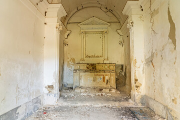 Abandoned sanatorium with a historic church in Sclafani Bagni, a small Sicilian mountain village in...