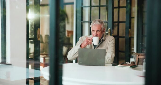 Coffee, home and mature man on laptop for remote work, planning and article research. Creative freelancer, morning and person on computer with drink for news story, editing report and website content