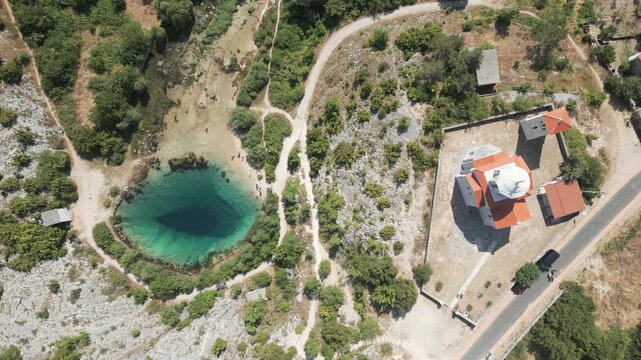Aerial top view of the Cetina river source located on the slopes of Dinara mountain in Croatia.