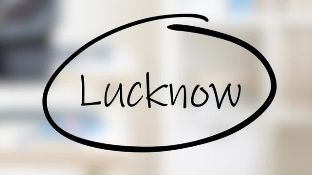 Lucknow Handwriting using black marker on glass