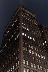 Fototapeta premium new york city modern office building in night