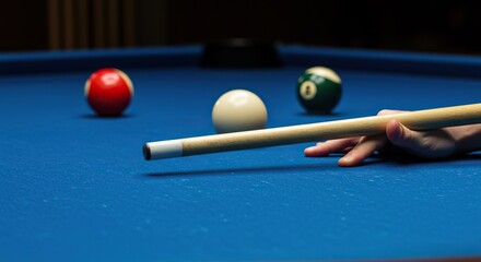 Close-up of a polished billiard cue stick, perfectly positioned on a vivid blue felt pool table, awaiting the decisive break ,vibrant ,anticipation ,perspective