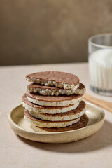 stack of rice cakes covered with milk chocolate