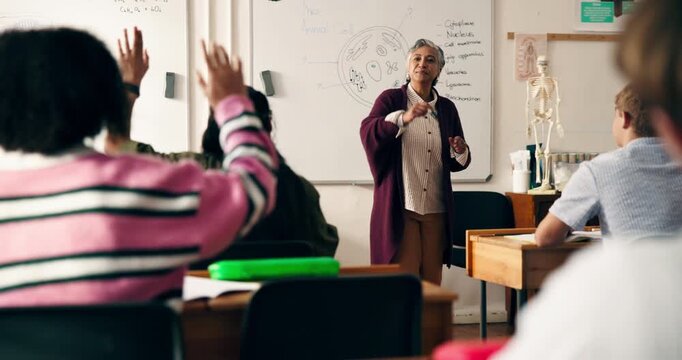 Classroom, teaching and woman with students, education and biology lesson on whiteboard and teacher. Communication, educator and answer for plant cell, hand raised and knowledge in high school