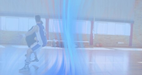 Players jumping rope dribbler receiving ball practicing defense in basketball training with overlay - Powered by Adobe