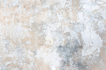 Old wall with peeling white paint