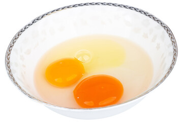 Duck egg yolk and chicken egg yolk together in one bowl on white background