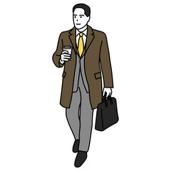 冬の通勤　コーヒーを持ったコート姿の男性